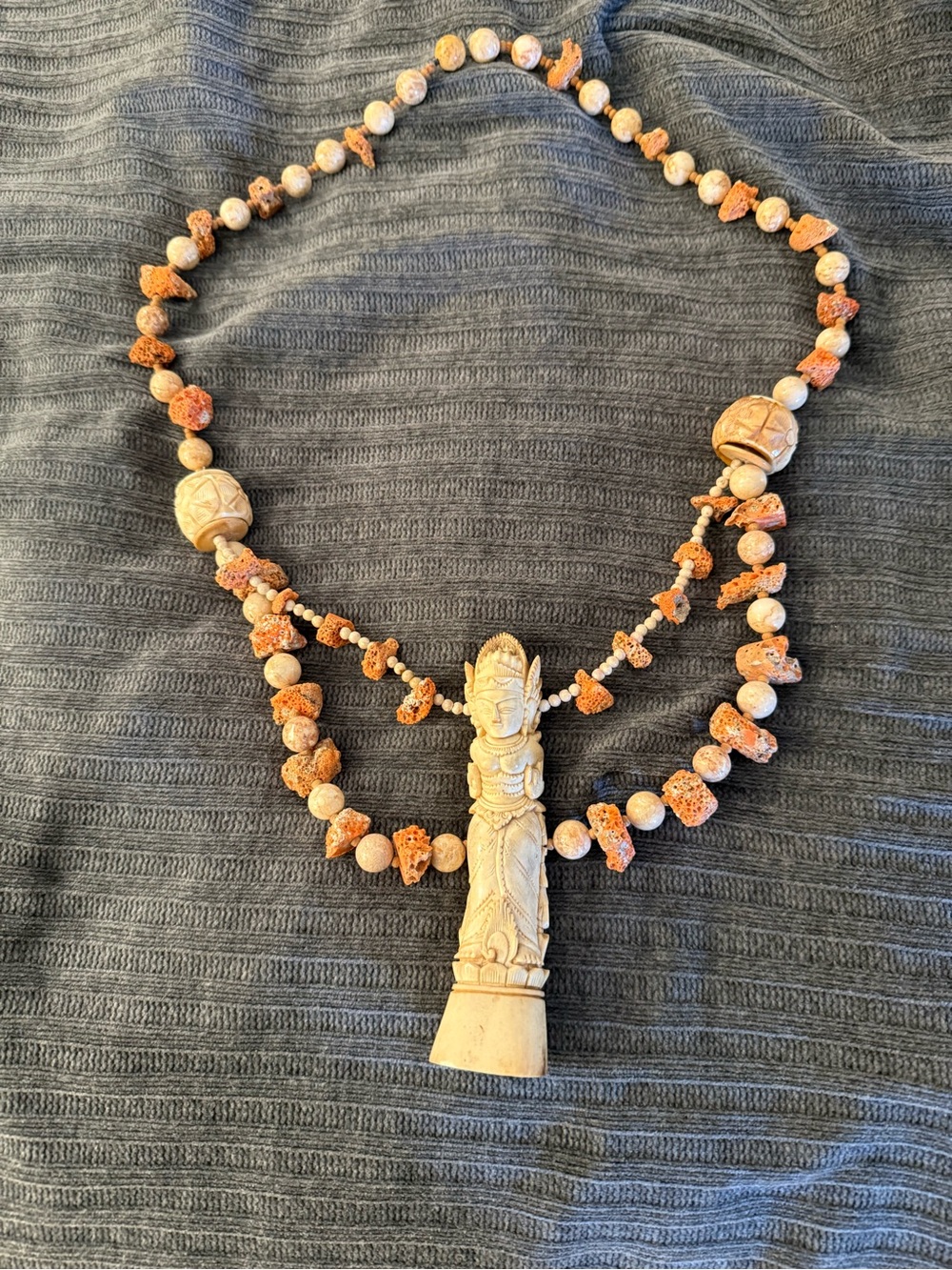 Vintage Balinese carved bone  by goddess pendant necklace orange sponge coral